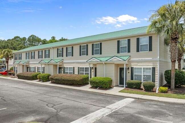 Building Photo - Where your commute is shorter than the Starbucks drive-thru line on 501. Grab the keys before som...