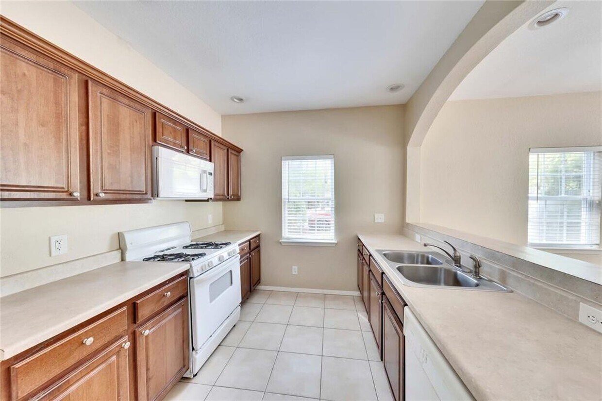 Building Photo - Welcome to this delightful two-story home!