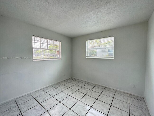 Building Photo - 6889 SW 16th Ct