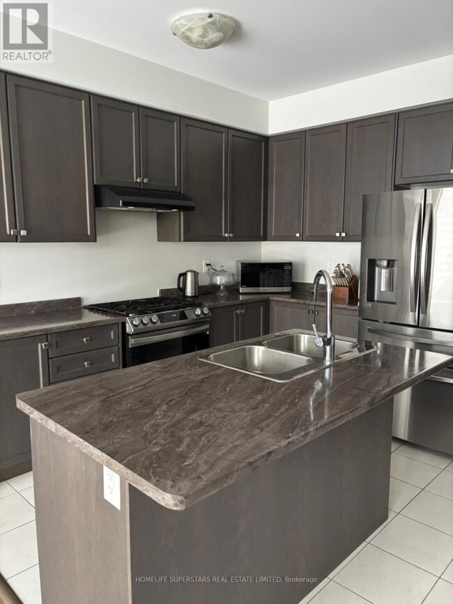 Photo du bâtiment - 8755 Sourgum Ave