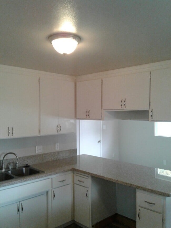 Building Photo - STOP BY, PEEK THROUGH THE WINDOWS AND EXPLORE THE AREA!