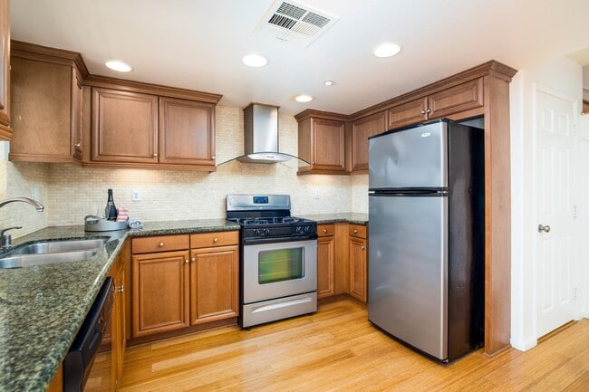 Kitchen With Stainless Steel Appliances - 11547 Magnolia Ave