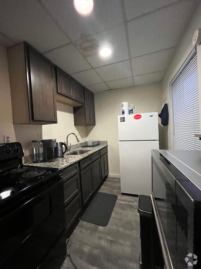 Building Photo - 1709 Tibbits Ave