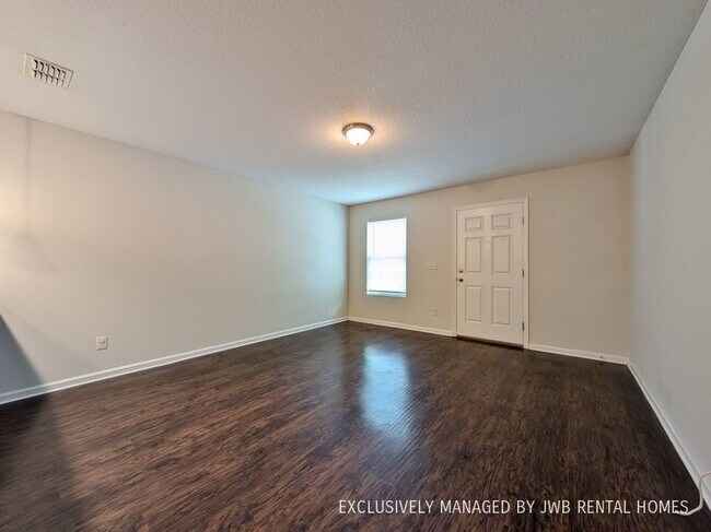 Building Photo - 8407 McGirts Village Ln