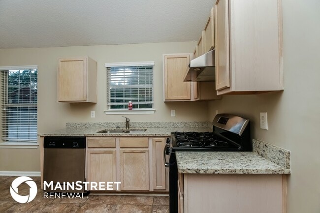 Building Photo - 6144 Idlewood Manor