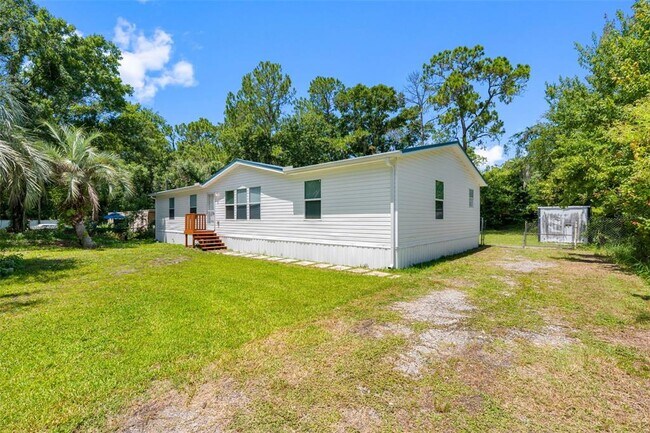 Foto del edificio - 6847 Woodsman Dr
