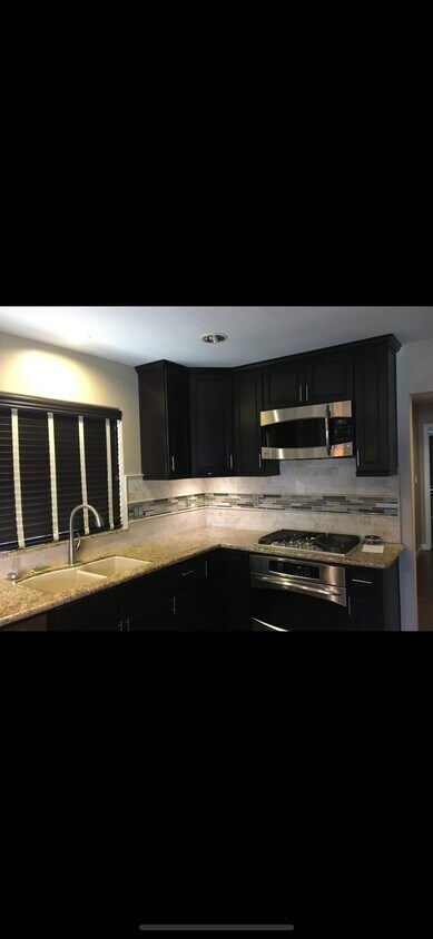 Building Photo - 8912 Long Island Dr