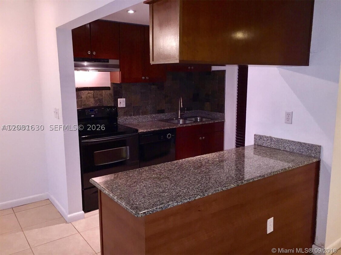 Building Photo - 8950 SW 69th Ct