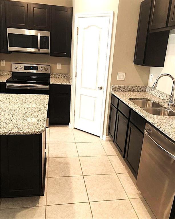 Foto del edificio - 10908 Bluestem Grass Ave