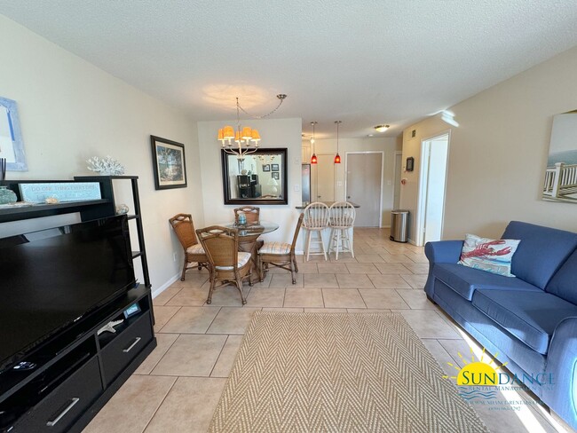 Building Photo - Welcome to your ideal furnished beach retr...