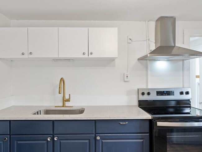 Building Photo - Renovated 3-Bedroom Apartment with Bonus Finished Attic & Spacious Shared Backyard