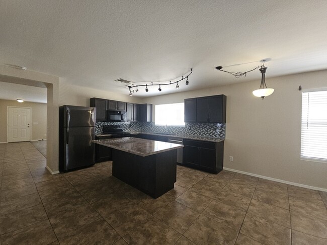 Building Photo - 8547 E Lobo Ave