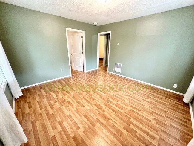 Building Photo - 2 Bedroom House with Backyard full of Frui...