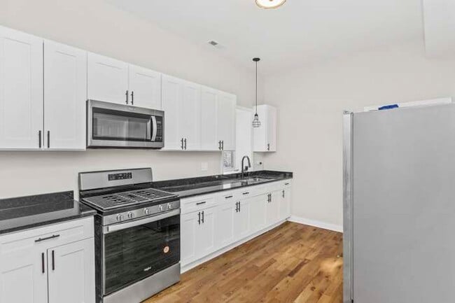 Building Photo - 6348 S Langley Ave