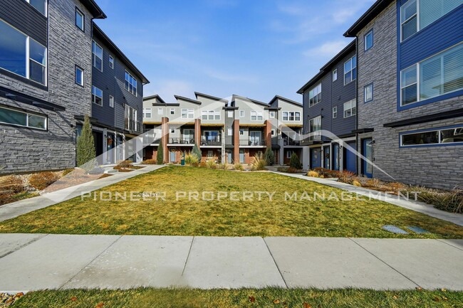 Photo - Spacious Townhouse with Central AC and 2-Car Garage