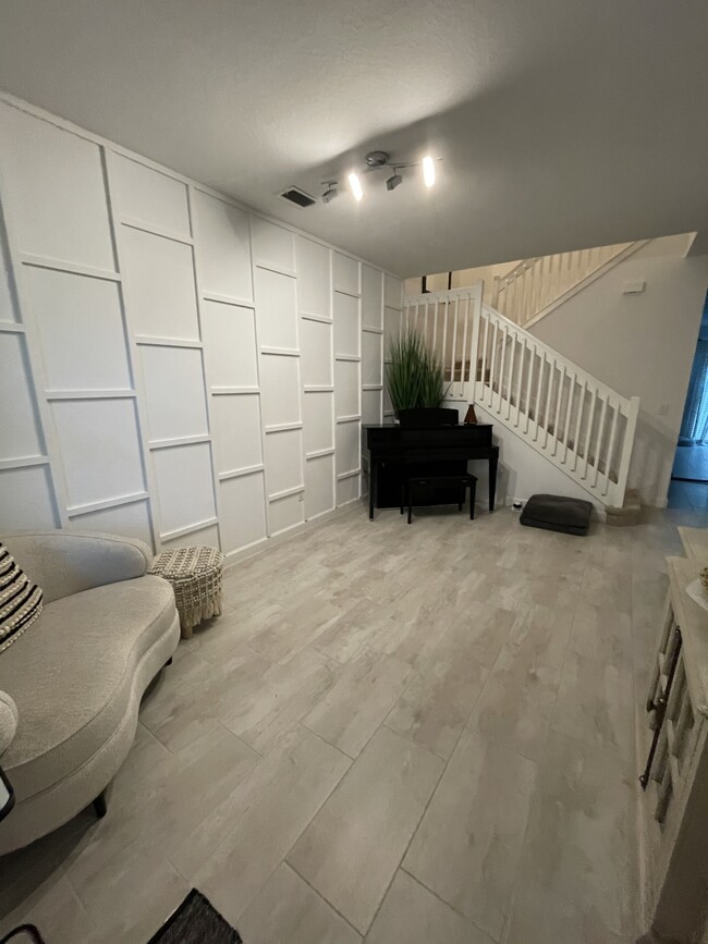 Foyer and front room - 12938 Anthorne Ln