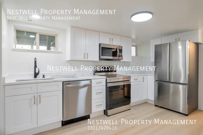 Building Photo - $500 OFF 1ST MONTH'S RENT - 2-bed Basement...