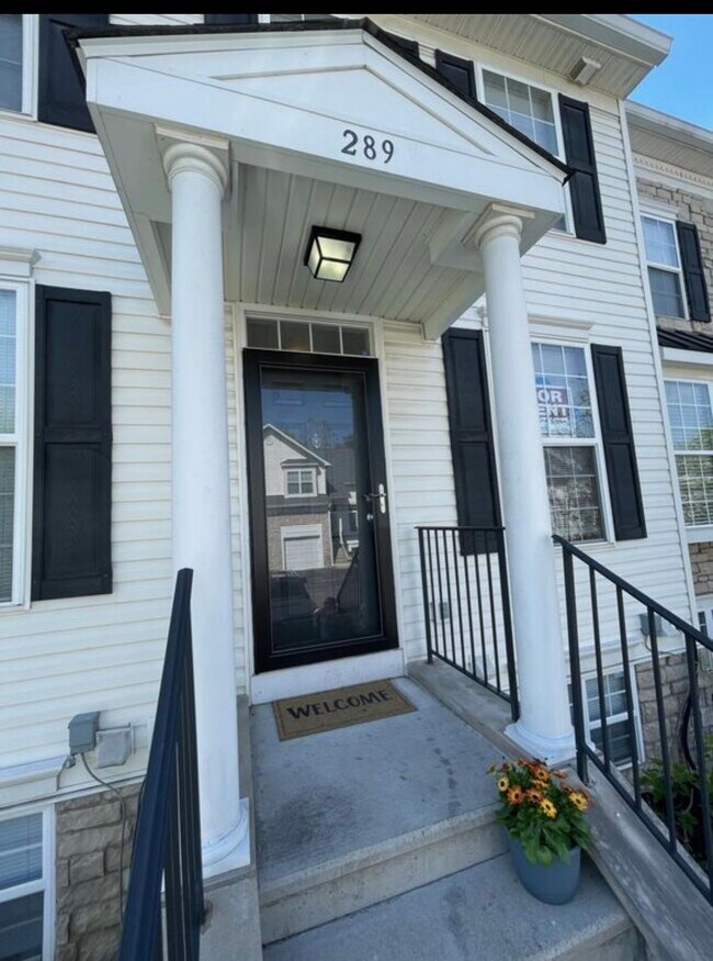 Welcoming front entrance with covered porch and private entry. - 289 Preswicke Ml