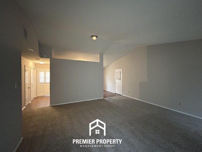 Building Photo - Spacious 3BR/2BA Near Southwind | High Ceilings, Fireplace & 2-Car Garage