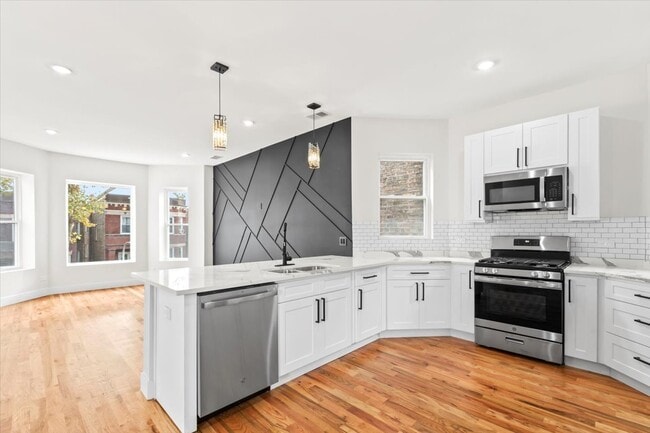 Foto del edificio - 6128 S Rhodes Ave