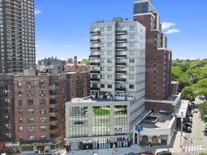 Building Photo - 124-28 Queens Blvd