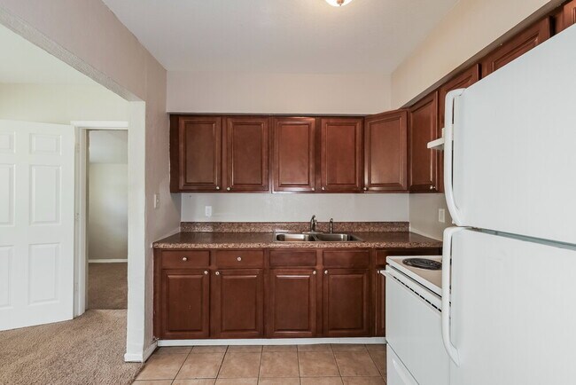 Building Photo - 2911 E 23rd Ave