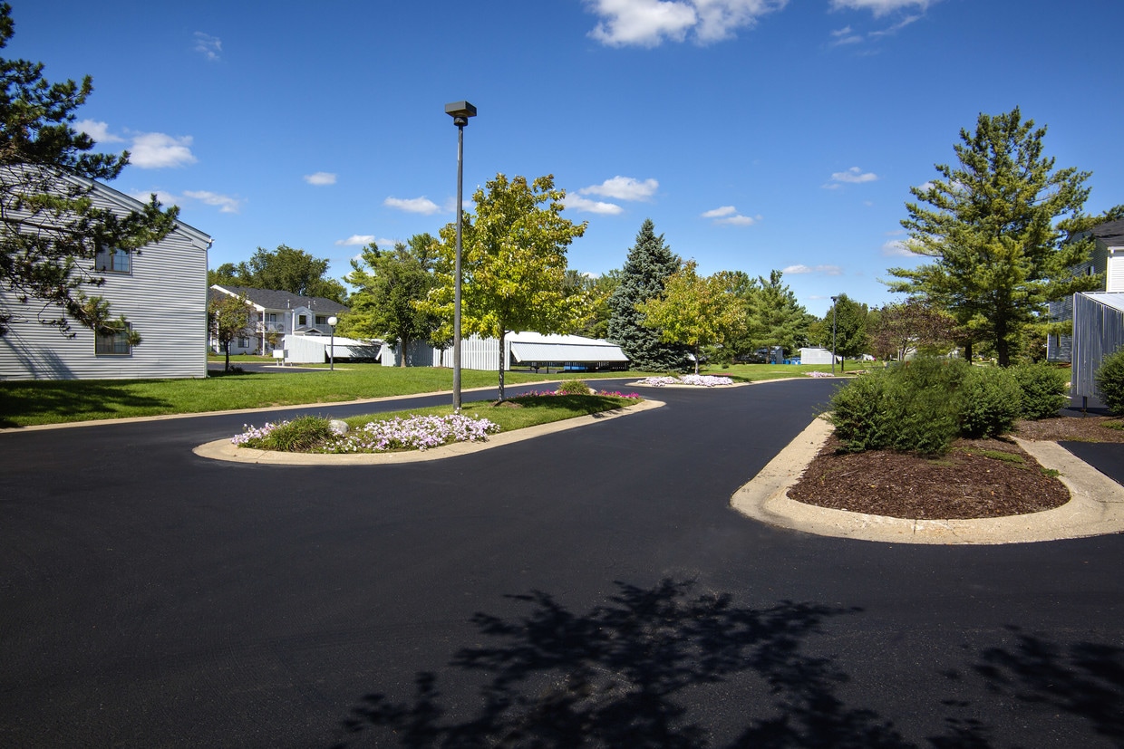 Well designed entry drive creates a welcoming first impression of the community character - Central Park Place