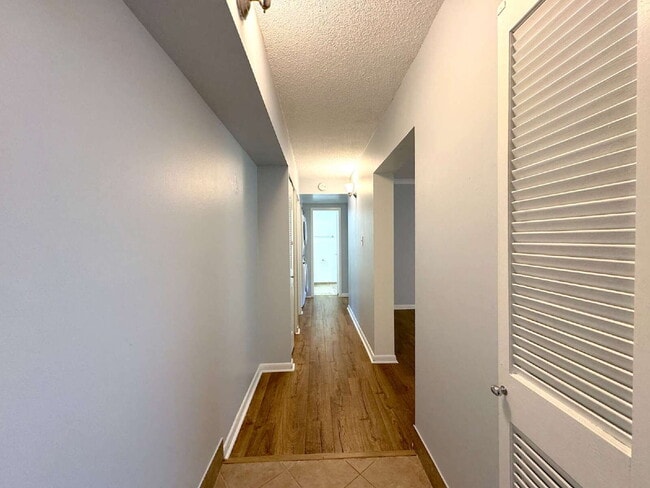 Building Photo - Welcome to this beautifully maintained first-floor condominium offering 2 bedrooms and 2 full bat...