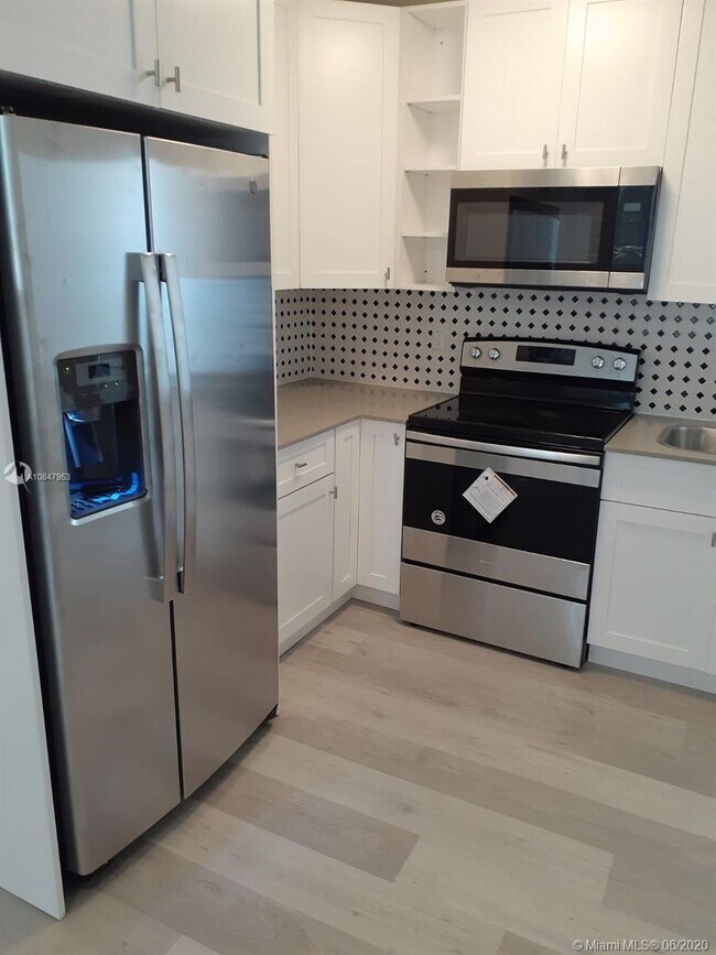 Building Photo - 6647 SW 59th Pl