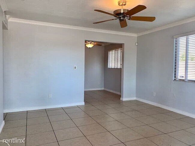 Building Photo - 3 br, 1 bath House - 4655 E 14th St