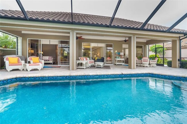 Building Photo - Turnkey furnished 4 bedroom, 3 bath pool home on the golf course in Boca Royale, with a full golf...