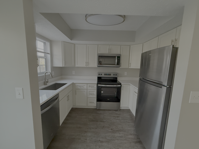 Newly remodeled, modern kitchen featuring all new stainless steel appliances - 7778 Willowcove Ct