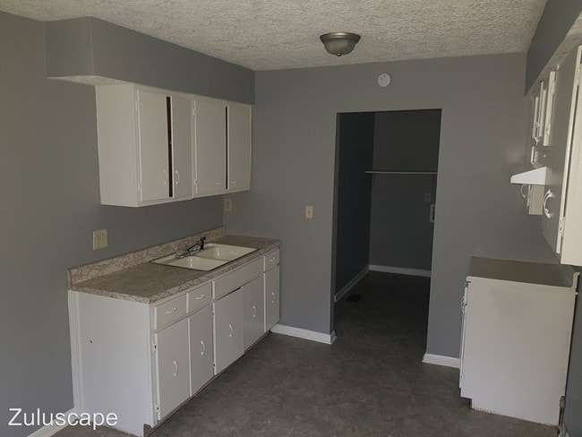 Building Photo - 3 br, 1 bath House - 610 W. 28th St.