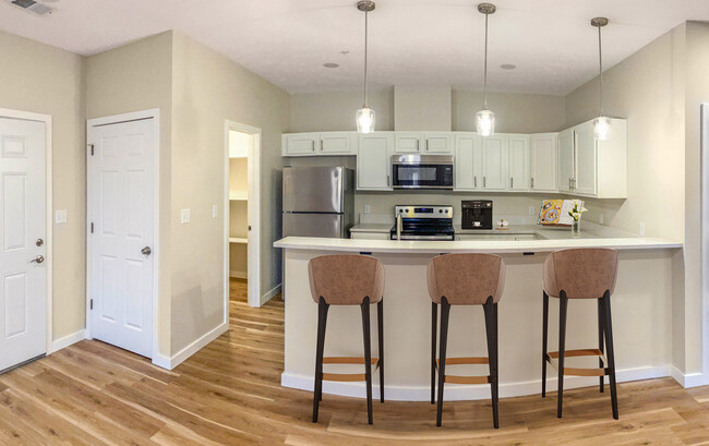 Modern Kitchen with Three-Seater Breakfast Bar - Burr Oaks Place