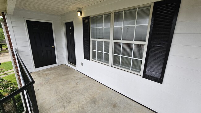 patios with extra storage - Evangeline Heights Apartments