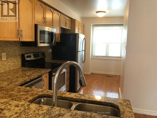 Photo du bâtiment - 5940 Glen Erin Dr