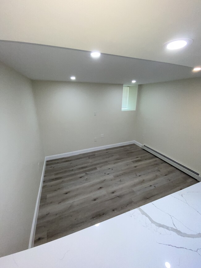 Nice bright living room area with recessed lighting - 26 Hazelwood St