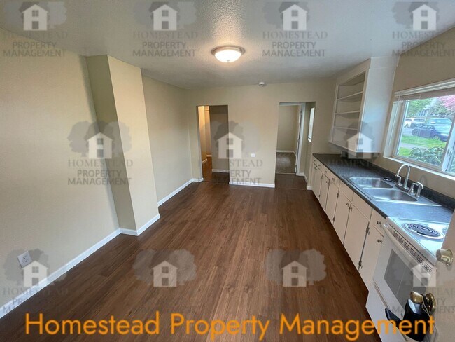 Foto del edificio - 219-219 1/2 S Monmouth Ave