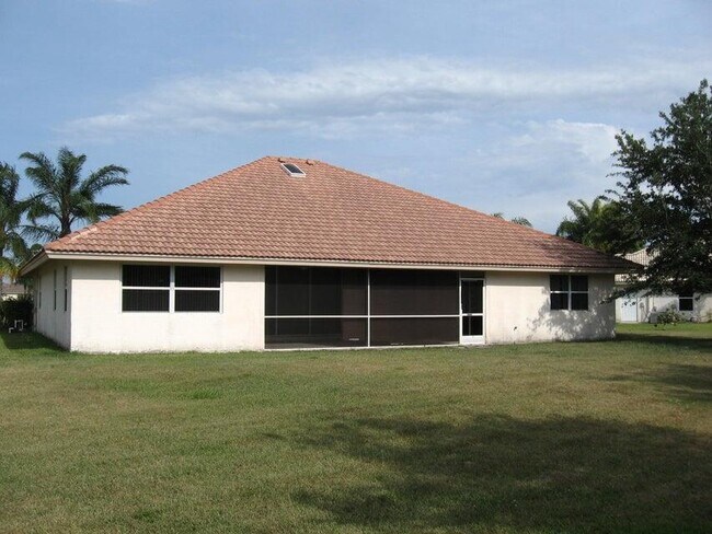 Building Photo - 5811 NW Rose Petal Ct