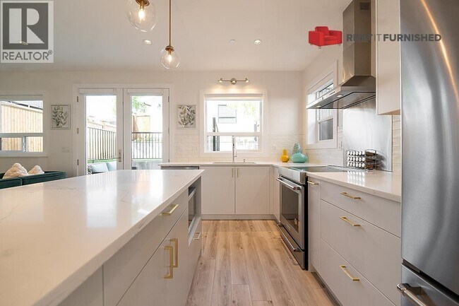 Photo du bâtiment - 3143 E 8th Ave