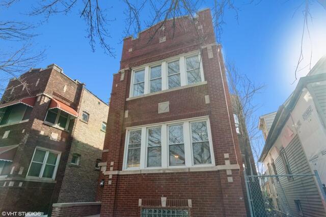 Foto del edificio - 1427 N Laramie Ave