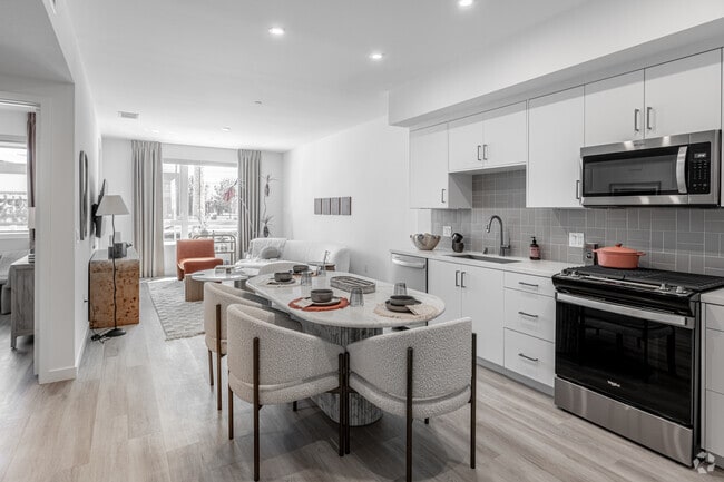 1BR, 1BA - 747SF - A3 - Kitchen, Dining Room and Living Room - Aurum