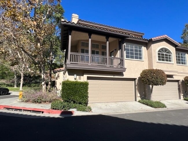 Building Photo - PICTURE PERFECT 2 BR/2 BATH PLUS LOFT END UNIT CONDO WITH DIRECT ACCESS 2 CAR GARAGE