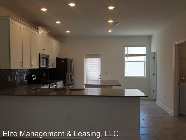 Building Photo - 3 br, 2.5 bath House - 5661 Quiet Palm Loop