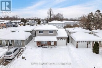 Building Photo - 512 Pinetree Crescent
