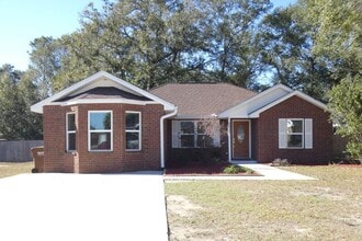 Building Photo - 6607 Woodbury Forest Dr