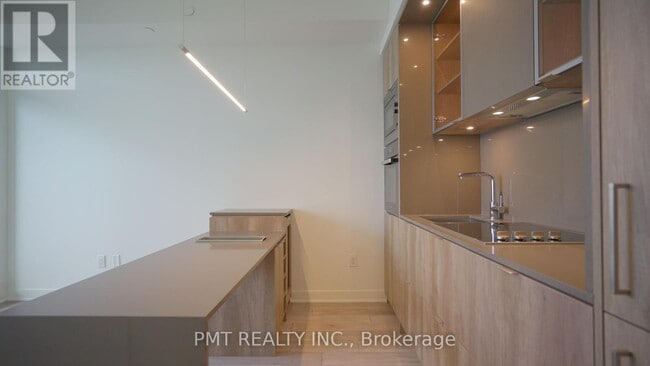 Photo du bâtiment - 11-4211 Yorkville Ave