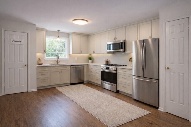 Diseño conceptual: cocina de 2 dormitorios con lavadero. - Fairway Manor Senior Rental Apartments 55+