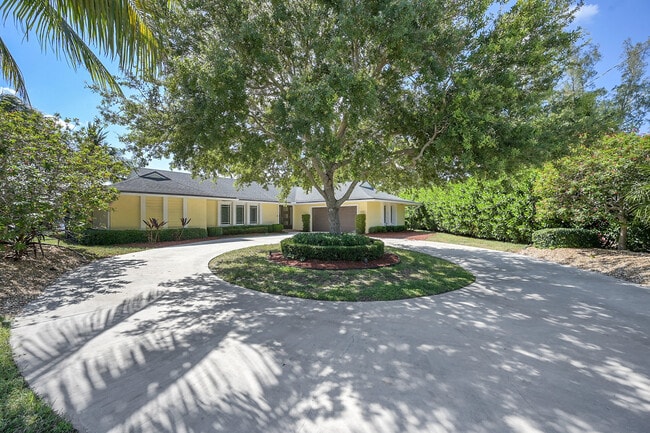 Building Photo - 6767 Tradewind Way