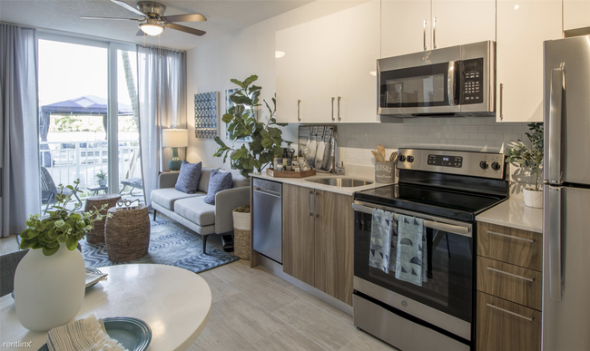 Building Photo - 3 br, 2 bath  - 5307 NW 7th St STUNNING  UNIT